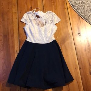 I’m selling a medium/small. Blue and white dress.